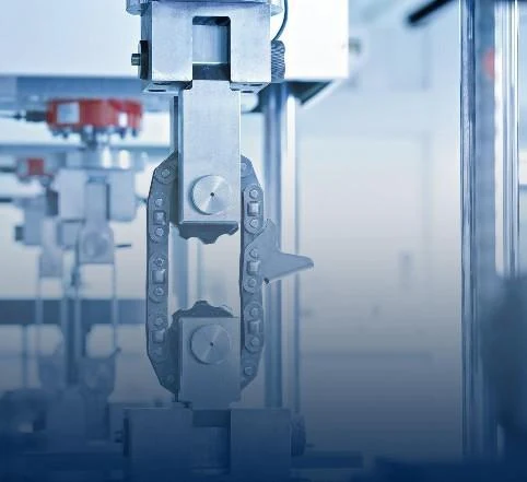 Close-up of chain held in mechanical testing equipment